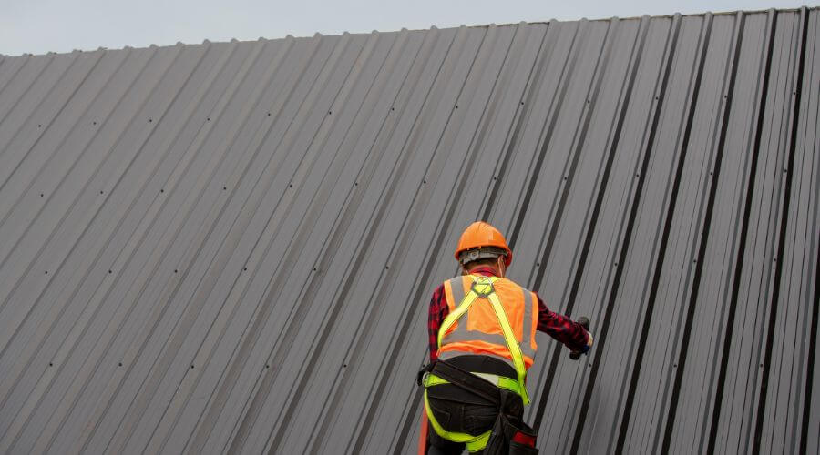 Professional metal roof installation services in Smithville, OK
